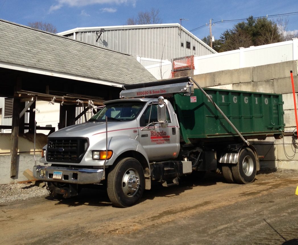 Hook Lift Truck with Dumpster – Riggio and Sons, Inc.